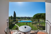 Studio mit Pool-/Golfplatzblick