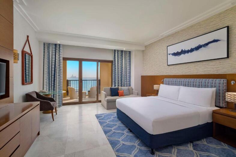 Junior Suite mit Kingsize-Bett, Balkon, Meerblick