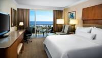 Zimmer mit 1 Kingsize-Bett und Meerblick